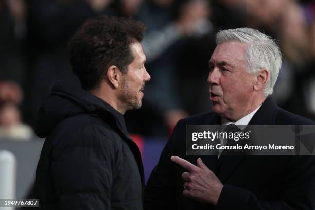 Manager Diego Pablo Simeone alias el Cholo of Atletico de Madrid welcomes manager Carlo Ancelotti of Real Madrid CF prior to start the Copa Del Rey...