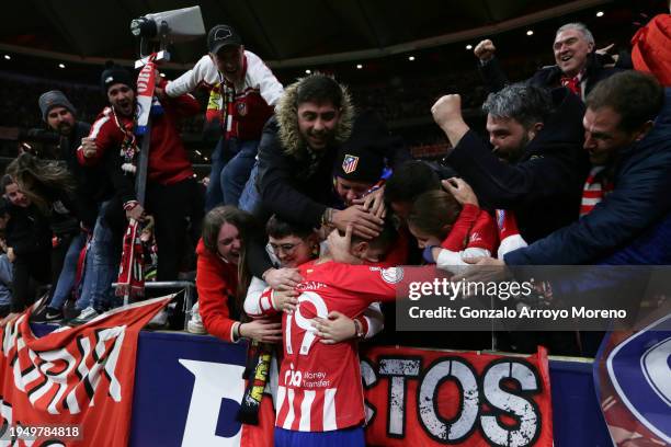 Alvaro Morata of Atletico de Madrid celebrates scoring their opening goal with the fans during Copa Del Rey Round of 16 match between Club Atletico...