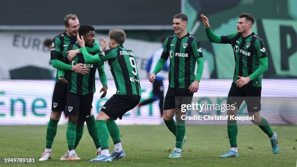 Daniel Kyerewaa of Muenster celebrates the first goal with his tzeam mates during the 3. Liga match between Preußen Münster and Arminia Bielefeld at...