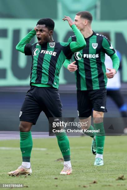 Daniel Kyerewaa of Muenster celebrates the first goal with his tzeam mates during the 3. Liga match between Preußen Münster and Arminia Bielefeld at...