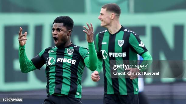Daniel Kyerewaa of Muenster celebrates the first goal with his tzeam mates during the 3. Liga match between Preußen Münster and Arminia Bielefeld at...
