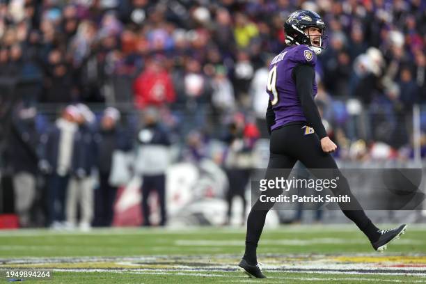 Place kicker Justin Tucker of the Baltimore Ravens celebrates a field goal against the Houston Texans during the first quarter in the AFC Divisional...
