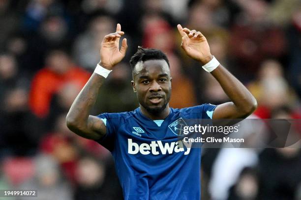 Maxwel Cornet of West Ham United celebrates scoring his team's first goal during the Premier League match between Sheffield United and West Ham...