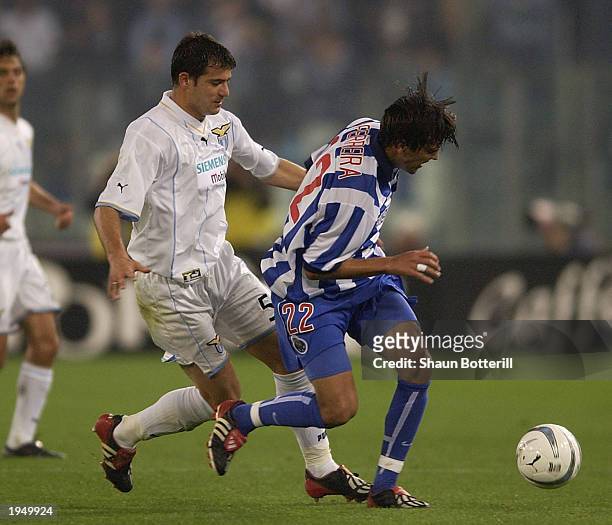 Paulo Ferreira of Porto is challenged by Stankovic of Lazio during the Lazio v Porto semi final 2nd leg UEFA Cup match on April 24, 2003 at the...