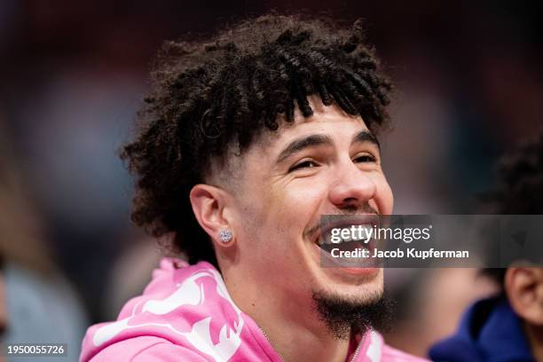 LaMelo Ball of the Charlotte Hornets looks on in the first quarter during their game against the Philadelphia 76ers at Spectrum Center on January 20,...