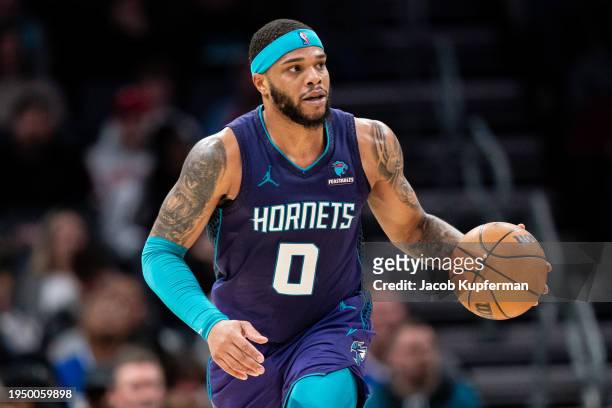 Miles Bridges of the Charlotte Hornets brings the ball up court against the Philadelphia 76ers during their game at Spectrum Center on January 20,...