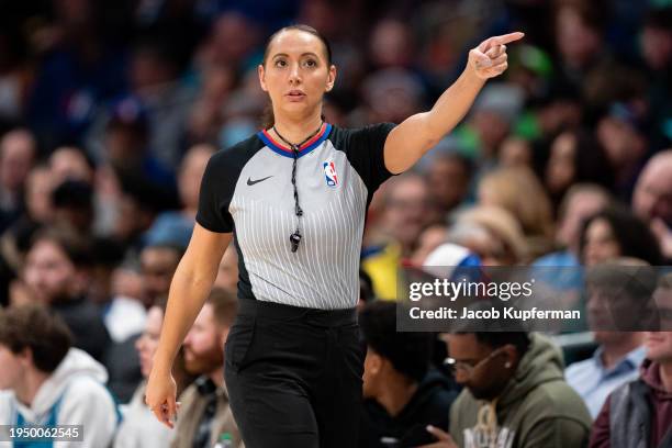 Referee Ashley Moyer-Gleich looks on during the game between the Charlotte Hornets and the Philadelphia 76ers at Spectrum Center on January 20, 2024...