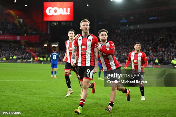 Oliver McBurnie of Sheffield United celebrates scoring his team's second goal from the penalty spot during the Premier League match between Sheffield...