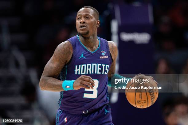 Terry Rozier of the Charlotte Hornets brings the ball up court /P during their game at Spectrum Center on January 20, 2024 in Charlotte, North...