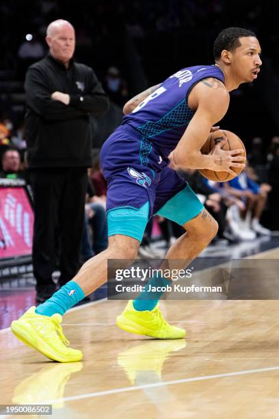 Nick Smith Jr. #8 of the Charlotte Hornets brings the ball up court against the Philadelphia 76ers during their game at Spectrum Center on January...