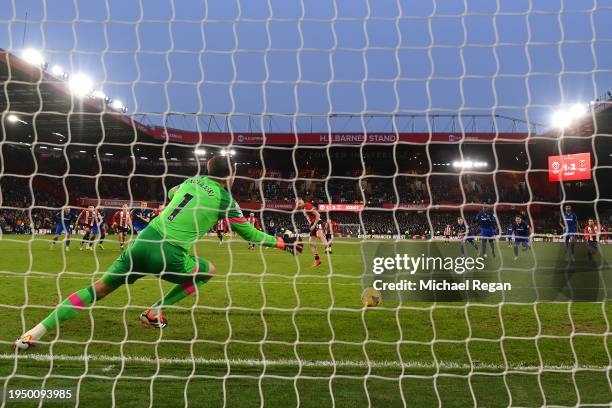 Lukasz Fabianski of West Ham United fails to make a save against Oliver McBurnie of Sheffield United during the Premier League match between...