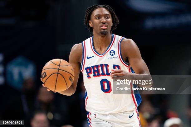 Tyrese Maxey of the Philadelphia 76ers brings the ball up court against the Charlotte Hornets during their game at Spectrum Center on January 20,...