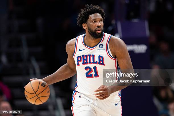 Joel Embiid of the Philadelphia 76ers brings the ball up court against the Charlotte Hornets during their game at Spectrum Center on January 20, 2024...