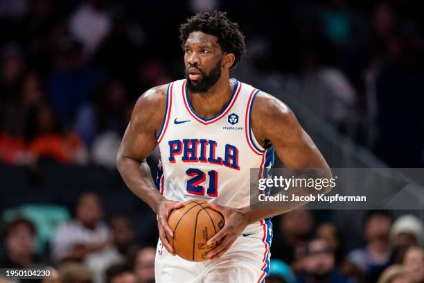 Joel Embiid of the Philadelphia 76ers brings the ball up court against the Charlotte Hornets during their game at Spectrum Center on January 20, 2024...