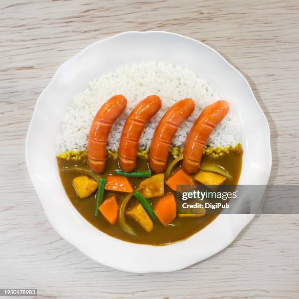 japanese curry with sausages - japanese curry stock pictures, royalty-free photos & images