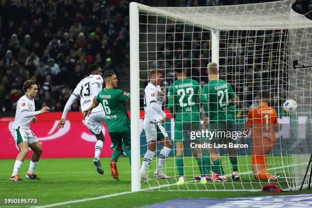 Jordan Siebatcheu of Borussia Moenchengladbach scores his team's first goal during the Bundesliga match between Borussia Mönchengladbach and FC...