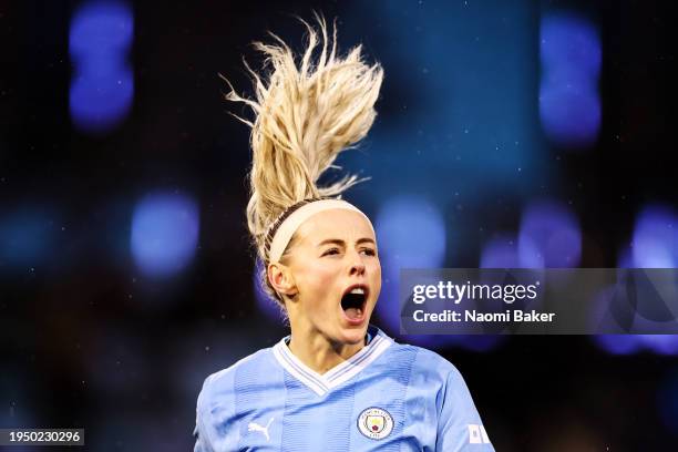 Chloe Kelly of Manchester City celebrates scoring their team's fifth goal during the Barclays Women's Super League match between Manchester City and...