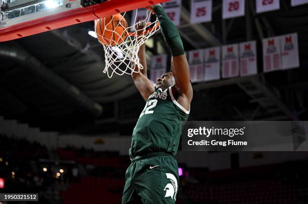 Mady Sissoko of the Michigan State Spartans dunks the ball in the first half against the Maryland Terrapins at Xfinity Center on January 21, 2024 in...