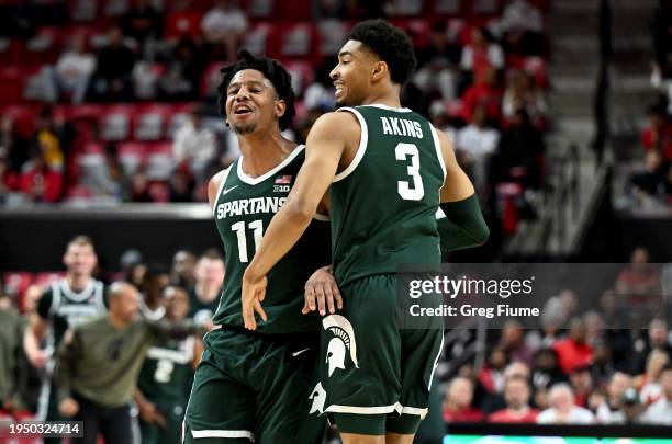 Hoggard and Jaden Akins of the Michigan State Spartans celebrate in the first half against the Maryland Terrapins at Xfinity Center on January 21,...