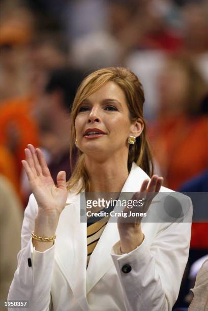 Juli Boeheim, wife of Syracuse head coach Jim Boeheim applauds after the play against Kansas during the championship game of the NCAA Men's Final...