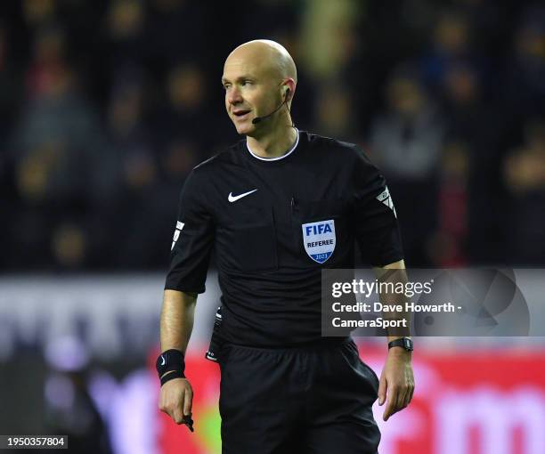 Referee Anthony Taylor during the Emirates FA Cup Third Round match between Wigan Athletic and Manchester United at DW Stadium on January 8, 2024 in...