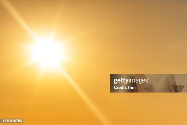 full bright sun in the sky - sonnenlicht stock-fotos und bilder