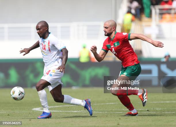 Gaël Kakuta of Democratic Republic of Congo is chased by Sofyan Amrabat of Morocco during the TotalEnergies CAF Africa Cup of Nations group stage...