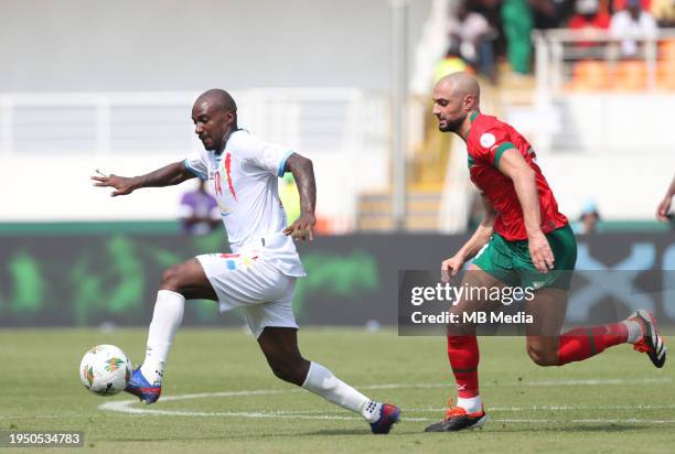 Gaël Kakuta of Democratic Republic of Congo is chased by Sofyan Amrabat of Morocco during the TotalEnergies CAF Africa Cup of Nations group stage...