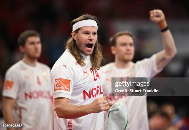 Mikkel Hansen of Denmark celebrates during the Men's EHF Euro 2024 main round match between Norway and Denmark at Barclays Arena on January 21, 2024...