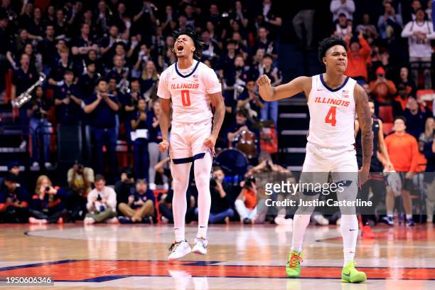 Terrence Shannon Jr. #0 and Justin Harmon of the Illinois Fighting Illini react after a play during the second half in the game against the Rutgers...