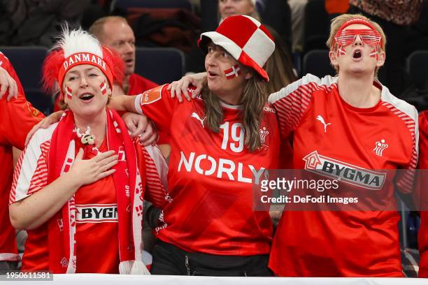 The fans from Denmark celebrate on the tribune during the Men's EHF Euro 2024 main round match between Norway and Denmark at Barclays Arena on...