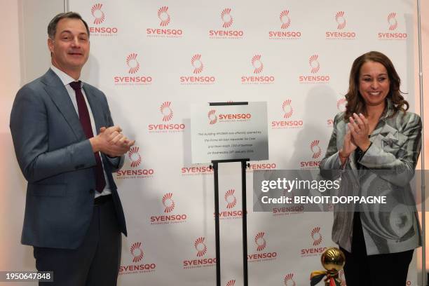 Belgium Prime Minister Alexander De Croo and Syensqo CEO Ilham Kadri applaud during the opening of the headquarters of Syensqo, spin-off from Solvay,...