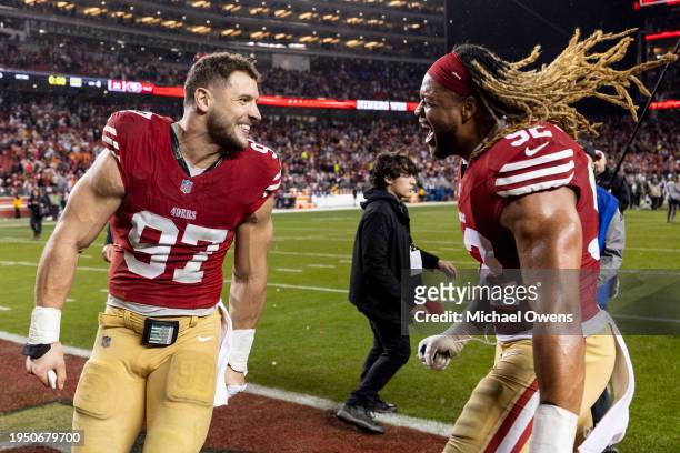 Nick Bosa of the San Francisco 49ers and Chase Young of the San Francisco 49ers celebrate following an NFL divisional round playoff football game...