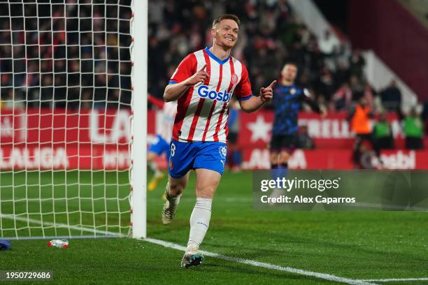 Viktor Tsyhankov of Girona FC celebrates scoring his team's fourth goal during the LaLiga EA Sports match between Girona FC and Sevilla FC at...