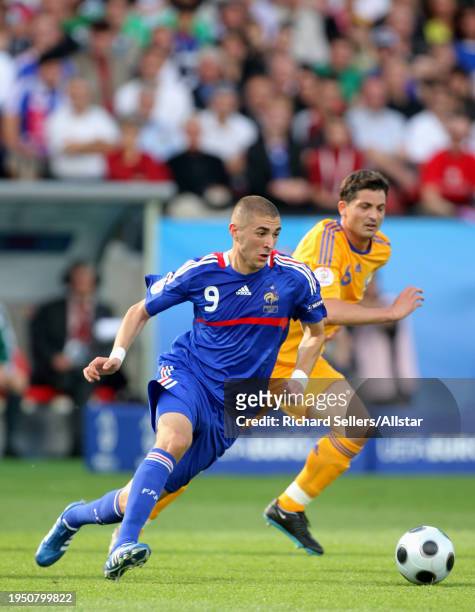 June 9: Karim Benzema of France and Mirel Radoi of Romania challenge during the UEFA Euro 2008 Group C match between Romania and France at Letzigrund...