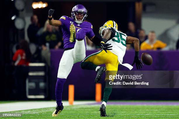 Corey Ballentine of the Green Bay Packers breaks up a pass intended for Justin Jefferson of the Minnesota Vikings in the first half at U.S. Bank...