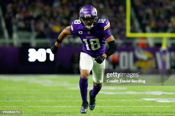 Justin Jefferson of the Minnesota Vikings competes against the Green Bay Packers in the second half at U.S. Bank Stadium on December 31, 2023 in...