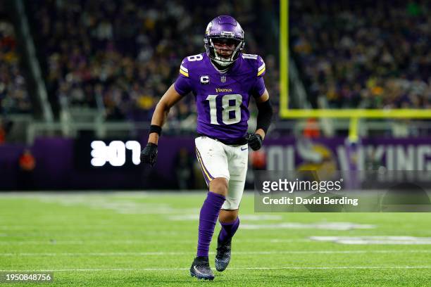 Justin Jefferson of the Minnesota Vikings competes against the Green Bay Packers in the second half at U.S. Bank Stadium on December 31, 2023 in...