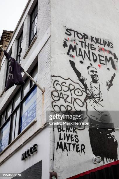 Black Lives Matter mural is pictured above Bethnal Green Road on 21st January 2024 in London, United Kingdom. The mural depicts a Black Lives Matter...