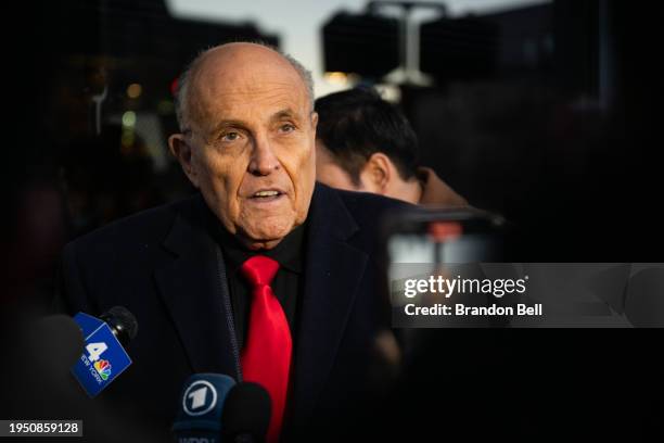 Rudy Giuliani speaks to members of the media where Republican candidate Florida Gov. Ron DeSantis was scheduled to host a campaign event on January...