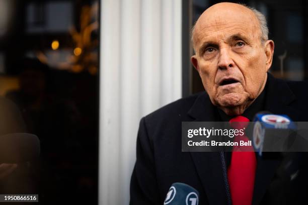 Rudy Giuliani speaks to members of the media where Republican candidate Florida Gov. Ron DeSantis was scheduled to host a campaign event on January...