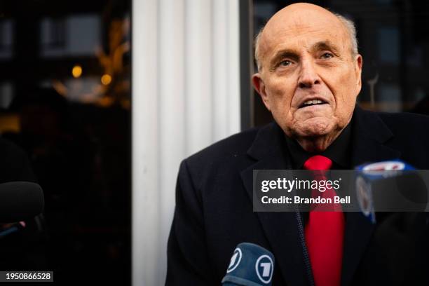 Rudy Giuliani speaks to members of the media where Republican candidate Florida Gov. Ron DeSantis was scheduled to host a campaign event on January...