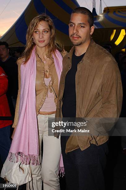 Magician David Blane arrives with his girlfriend for the opening night of "Cirque Du Soleil's Varekai" April 24, 2003 at Randall's Island in New York.