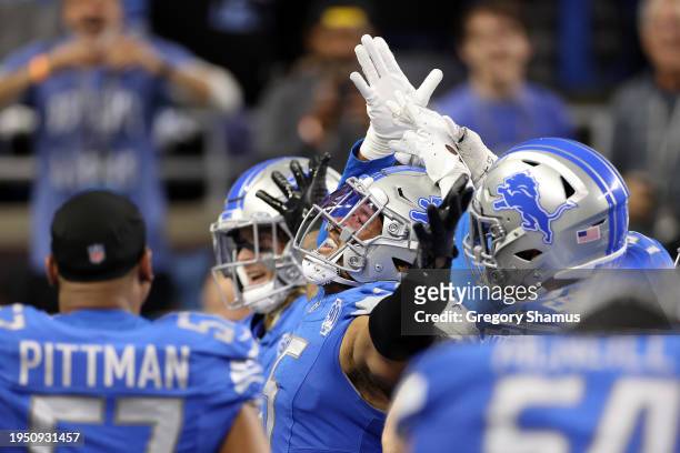 Derrick Barnes of the Detroit Lions celebrates after an interception against the Tampa Bay Buccaneers during the fourth quarter of the NFC Divisional...