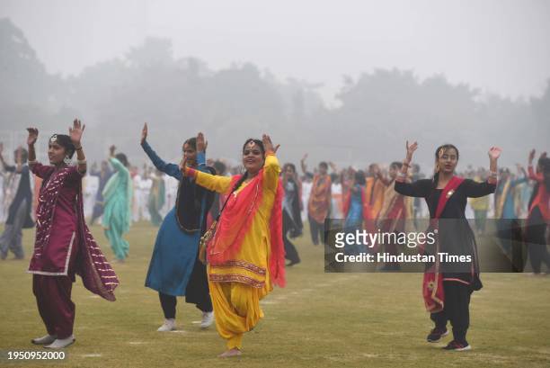 Schools students seen performing during Full Dress Rehearsals for the Republic Day Parade at Tau Devi Lal Stadium, Sector-38 near Rajiv Chowk, on...