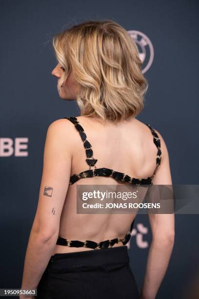 Belgian actress and singer Pommelien Thijs poses as she arrives at the 16th edition of the MIA's award show, in Antwerp, on January 24, 2024. /...