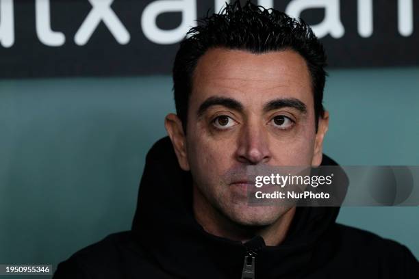 Xavi Hernandez head coach of Barcelona sitting on the bench during the Copa del Rey match between Athletic Club and FC Barcelona at San Mames Stadium...