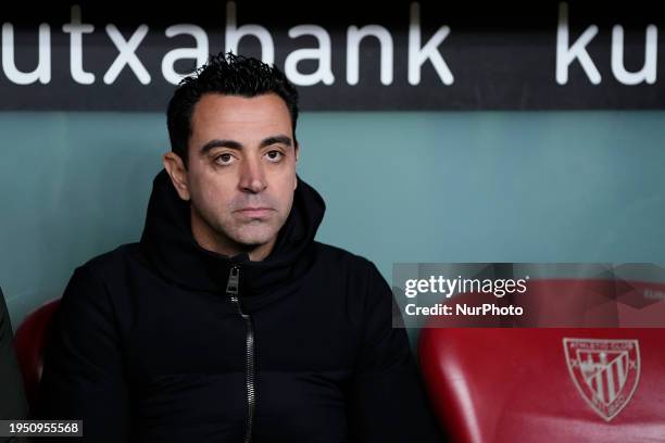 Xavi Hernandez head coach of Barcelona sitting on the bench during the Copa del Rey match between Athletic Club and FC Barcelona at San Mames Stadium...