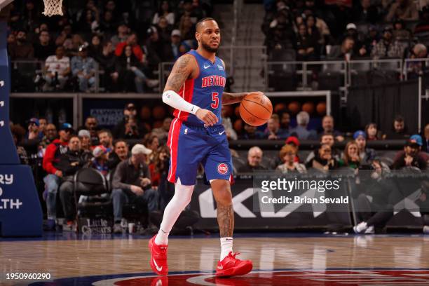 Monte Morris of the Detroit Pistons dribbles the ball during the game against the Charlotte Hornets on January 24, 2024 at Little Caesars Arena in...