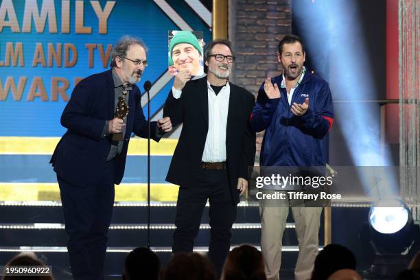 In this image released on January 27, Robert Smigel, Robert Marianetti, and Adam Sandler speak onstage during the 26th Annual Family Film And TV...
